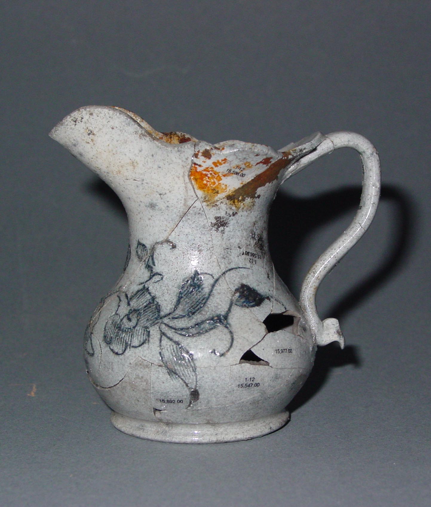 Cross-mended white salt-glazed stoneware creamer